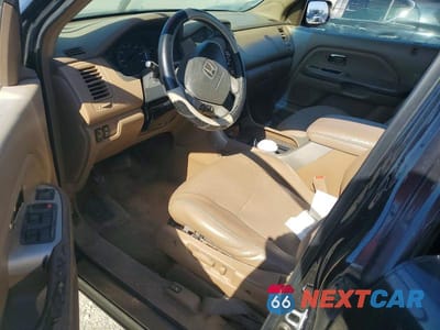 Zdjęcie 8 z 13 samochodu: 2004 HONDA PILOT EXL VIN:2HKYF18504H611758 - miniatura