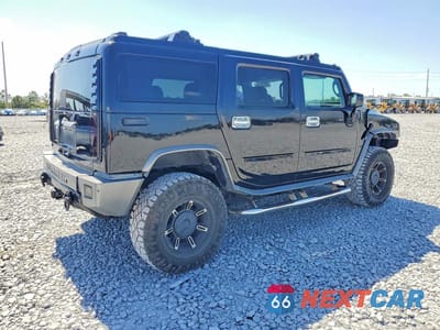 Trzecie zdjęcie samochodu z tyłu: 2003 HUMMER H2 VIN:5GRGN23U03H120685 - miniatura