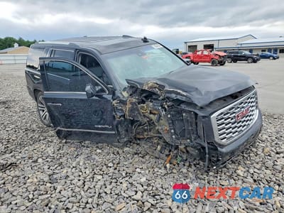 Czwarte zdjęcie samochodu z boku: 2018 GMC YUKON DENALI VIN:1GKS1CKJ3JR170285 - miniatura