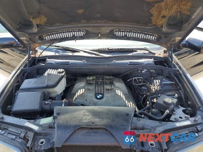 Zdjęcie 12 z 13 samochodu: 2004 BMW X5 4.8IS VIN:5UXFA93574LE81521 - miniatura
