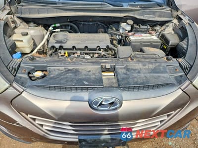 Zdjęcie 11 z 12 samochodu: 2012 HYUNDAI TUCSON GLS VIN:KM8JUCAC1CU415808 - miniatura