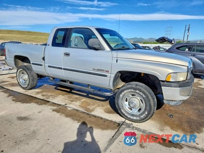 Czwarte zdjęcie samochodu z boku: 1999 DODGE RAM 2500 VIN:1B7KF23ZXXJ606715 - miniatura