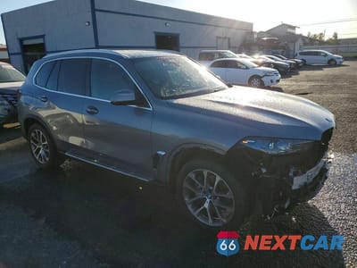 Czwarte zdjęcie samochodu z boku: 2026 BMW X5 SDRIVE 40I VIN:5UX13EU05T9065654 - miniatura