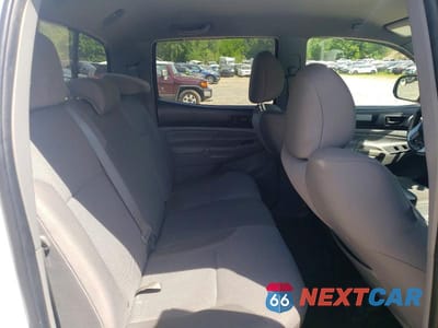 Zdjęcie 10 z 12 samochodu: 2013 TOYOTA TACOMA DOUBLE CAB VIN:3TMLU4EN9DM111775 - miniatura