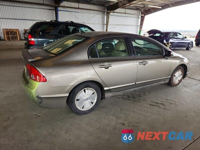 Trzecie zdjęcie samochodu z tyłu: 2006 HONDA CIVIC HYBRID VIN:JHMFA36206S028801 - miniatura