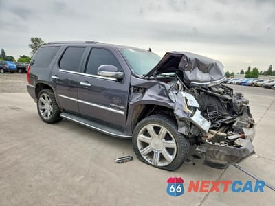 Czwarte zdjęcie samochodu z boku: 2011 CADILLAC ESCALADE LUXURY VIN:1GYS4BEFXBR277642 - miniatura