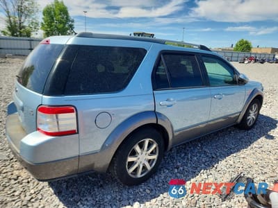 Trzecie zdjęcie samochodu z tyłu: 2008 FORD TAURUS X SEL VIN:1FMDK05WX8GA38553 - miniatura