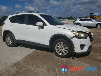 Czwarte zdjęcie samochodu z boku: 2015 MAZDA CX-5 TOURING VIN:JM3KE2CY6F0501062 - miniatura