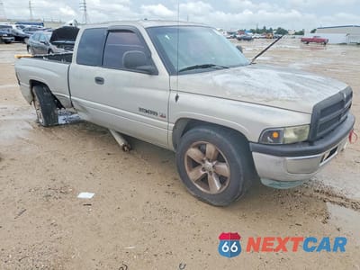 Czwarte zdjęcie samochodu z boku: 1999 DODGE RAM 1500 VIN:3B7HC12Y5XG130462 - miniatura