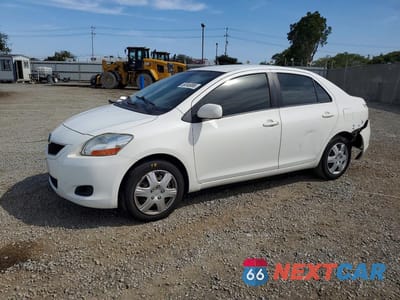 2009 TOYOTA YARIS BASE JTDBT903X91321095 - główne zdjęcie licytacji z USA - miniatura