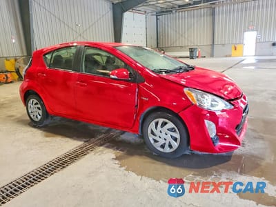 Czwarte zdjęcie samochodu z boku: 2015 TOYOTA PRIUS C TWO VIN:JTDKDTB35F1091212 - miniatura