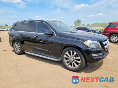 Czwarte zdjęcie samochodu z boku: 2014 MERCEDES-BENZ GL 450 4MATIC VIN:4JGDF7CE6EA401596 - miniatura