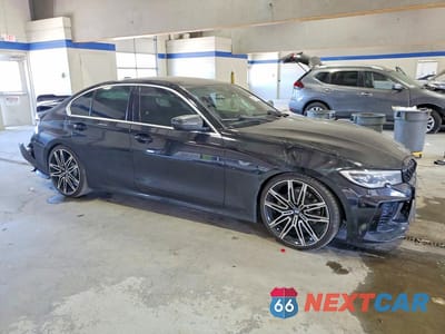 Czwarte zdjęcie samochodu z boku: 2020 BMW 330I VIN:3MW5R1J09L8B12111 - miniatura
