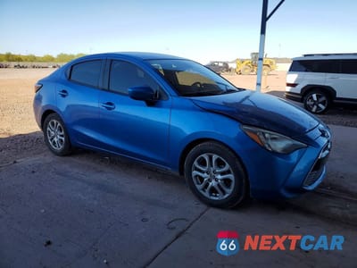 Czwarte zdjęcie samochodu z boku: 2016 SCION IA BASE VIN:3MYDLBZV4GY131663 - miniatura
