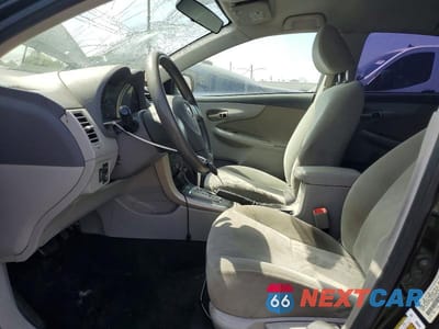 Zdjęcie 7 z 13 samochodu: 2010 TOYOTA COROLLA LE VIN:1NXBU4EE1AZ285449 - miniatura
