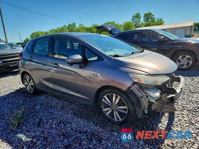 Czwarte zdjęcie samochodu z boku: 2016 HONDA FIT EX VIN:JHMGK5H71GS002893 - miniatura