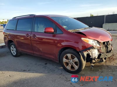 Czwarte zdjęcie samochodu z boku: 2015 TOYOTA SIENNA LE VIN:5TDKK3DC7FS644982 - miniatura