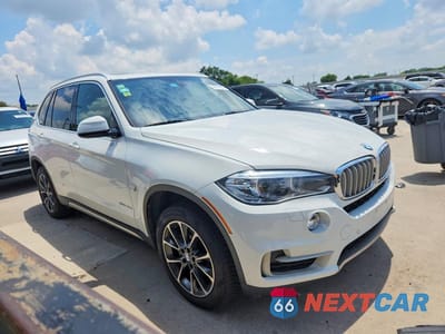 Czwarte zdjęcie samochodu z boku: 2017 BMW X5 XDR40E VIN:5UXKT0C33H0V97774 - miniatura