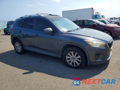 Czwarte zdjęcie samochodu z boku: 2014 MAZDA CX-5 TOURING VIN:JM3KE2CY3E0402617 - miniatura