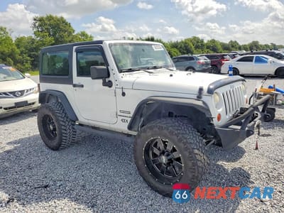 Czwarte zdjęcie samochodu z boku: 2011 JEEP WRANGLER SPORT VIN:1J4AA2D10BL568065 - miniatura
