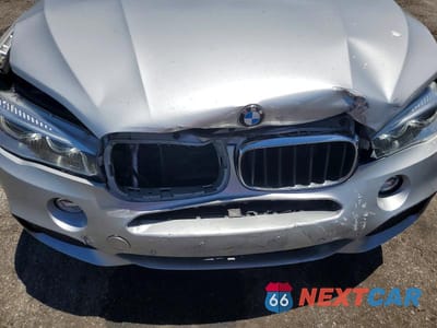Zdjęcie 12 z 13 samochodu: 2018 BMW X5 XDRIVE35I VIN:5UXKR0C50J0X88204 - miniatura