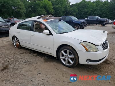 Czwarte zdjęcie samochodu z boku: 2004 NISSAN MAXIMA 3.5 SE VIN:1N4BA41E64C874516 - miniatura
