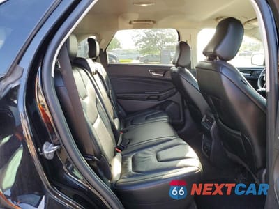 Zdjęcie 11 z 13 samochodu: 2021 FORD EDGE TITANIUM VIN:2FMPK3K92MBA51747 - miniatura