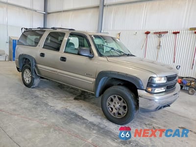 Czwarte zdjęcie samochodu z boku: 2000 CHEVROLET SUBURBAN K1500 VIN:3GNFK16T7YG123563 - miniatura