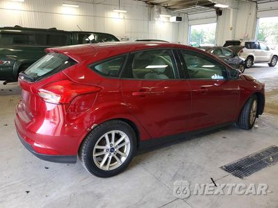 Trzecie zdjęcie samochodu z tyłu: 2016 FORD FOCUS SE VIN:1FADP3K21GL319225 - miniatura
