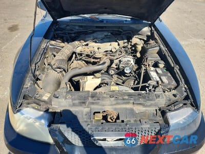 Zdjęcie 11 z 12 samochodu: 2000 FORD MUSTANG VIN:1FAFP4047YF123843 - miniatura