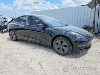 Czwarte zdjęcie samochodu z boku: 2023 TESLA MODEL 3 VIN:5YJ3E1EA4PF460120 - miniatura
