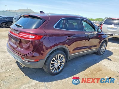 Trzecie zdjęcie samochodu z tyłu: 2018 LINCOLN MKC RESERVE VIN:5LMCJ3D94JUL20557 - miniatura