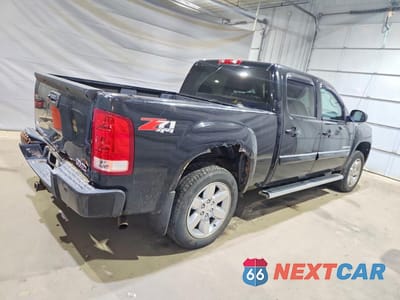 Trzecie zdjęcie samochodu z tyłu: 2013 GMC SIERRA K1500 SLT VIN:3GTP2WE77DG219296 - miniatura