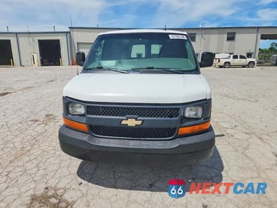 Piąte zdjęcie samochodu w środku: 2014 CHEVROLET EXPRESS G1500 VIN:1GCSGAFX9E1191465 - miniatura