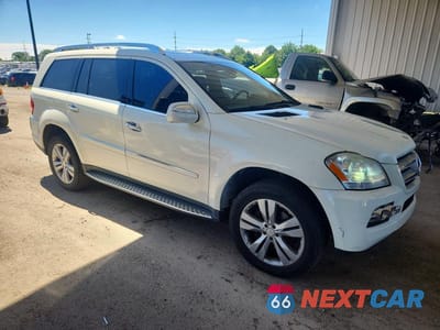 Czwarte zdjęcie samochodu z boku: 2010 MERCEDES-BENZ GL 450 4MATIC VIN:4JGBF7BE0AA561251 - miniatura