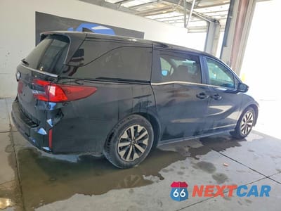 Trzecie zdjęcie samochodu z tyłu: 2025 HONDA ODYSSEY EXL VIN:5FNRL6H60SB081225 - miniatura