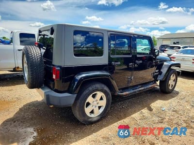 Trzecie zdjęcie samochodu z tyłu: 2010 JEEP WRANGLER UNLIMITED SAHARA VIN:1J4BA5H18AL205639 - miniatura