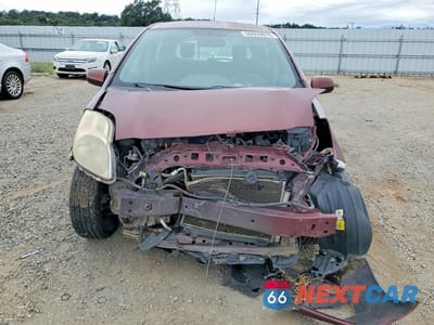 Piąte zdjęcie samochodu w środku: 2010 TOYOTA YARIS BASE VIN:JTDKT4K39A5294498 - miniatura