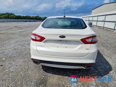 Zdjęcie 6 z 12 samochodu: 2016 FORD FUSION SE VIN:3FA6P0H9XGR130313 - miniatura