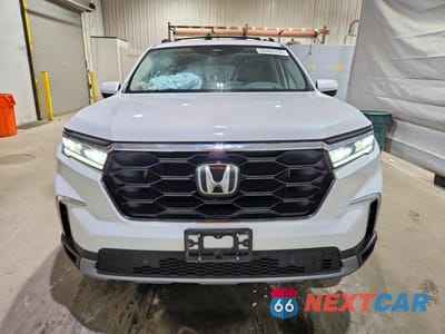 Piąte zdjęcie samochodu w środku: 2024 HONDA PILOT ELITE VIN:5FNYG1H87RB032229 - miniatura
