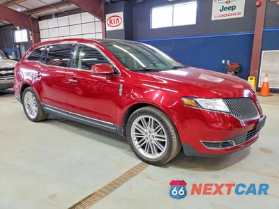 Czwarte zdjęcie samochodu z boku: 2016 LINCOLN MKT VIN:2LMHJ5AT7GBL02674 - miniatura
