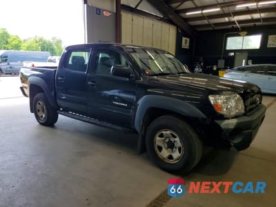 Czwarte zdjęcie samochodu z boku: 2009 TOYOTA TACOMA DOUBLE CAB VIN:3TMLU42N19M033195 - miniatura