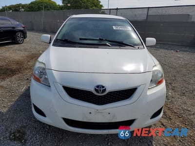 Piąte zdjęcie samochodu w środku: 2009 TOYOTA YARIS BASE VIN:JTDBT903X91321095 - miniatura