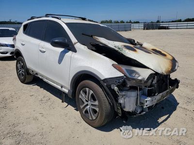Czwarte zdjęcie samochodu z boku: 2017 TOYOTA RAV4 LE VIN:JTMZFREV5HJ715201 - miniatura