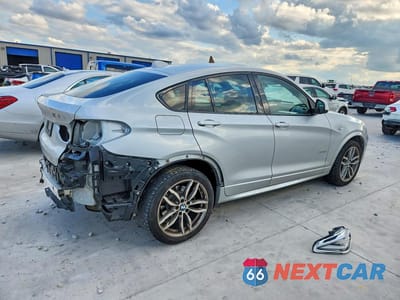 Trzecie zdjęcie samochodu z tyłu: 2016 BMW X4 XDRIVE28I VIN:5UXXW3C55G0M89588 - miniatura