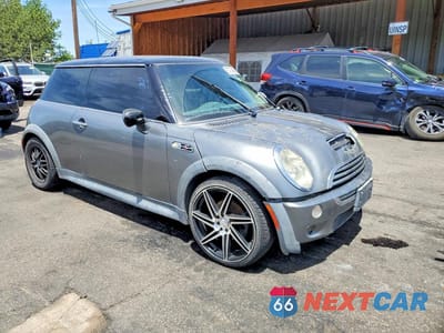 Czwarte zdjęcie samochodu z boku: 2002 MINI COOPER S VIN:WMWRE33482TD56884 - miniatura