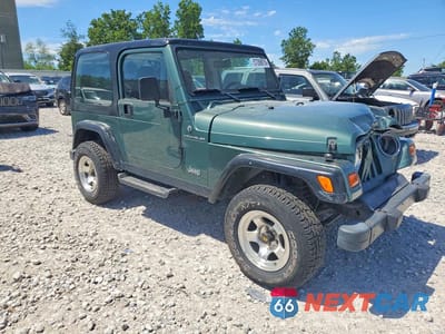 Czwarte zdjęcie samochodu z boku: 1999 JEEP WRANGLER / TJ SE VIN:1J4FY29PXXP436266 - miniatura