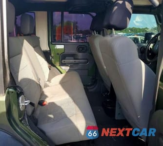 Zdjęcie 10 z 13 samochodu: 2007 JEEP WRANGLER SAHARA VIN:1J4GB59117L143088 - miniatura