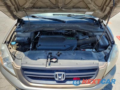 Zdjęcie 12 z 14 samochodu: 2003 HONDA PILOT EX VIN:2HKYF18433H566241 - miniatura