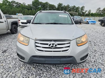 Piąte zdjęcie samochodu w środku: 2010 HYUNDAI SANTA FE GLS VIN:5NMSG3AB8AH364643 - miniatura